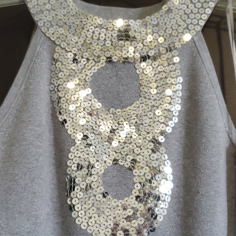 INC silver sparkle at front/neckline